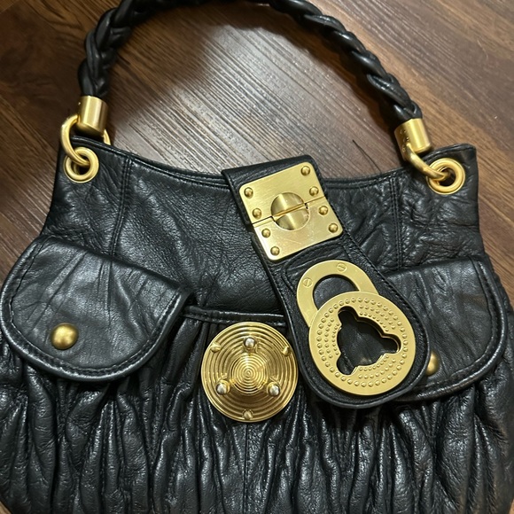 black leather purse with gold clasp. STEVEN by Steve Madden - Picture 2 of 6